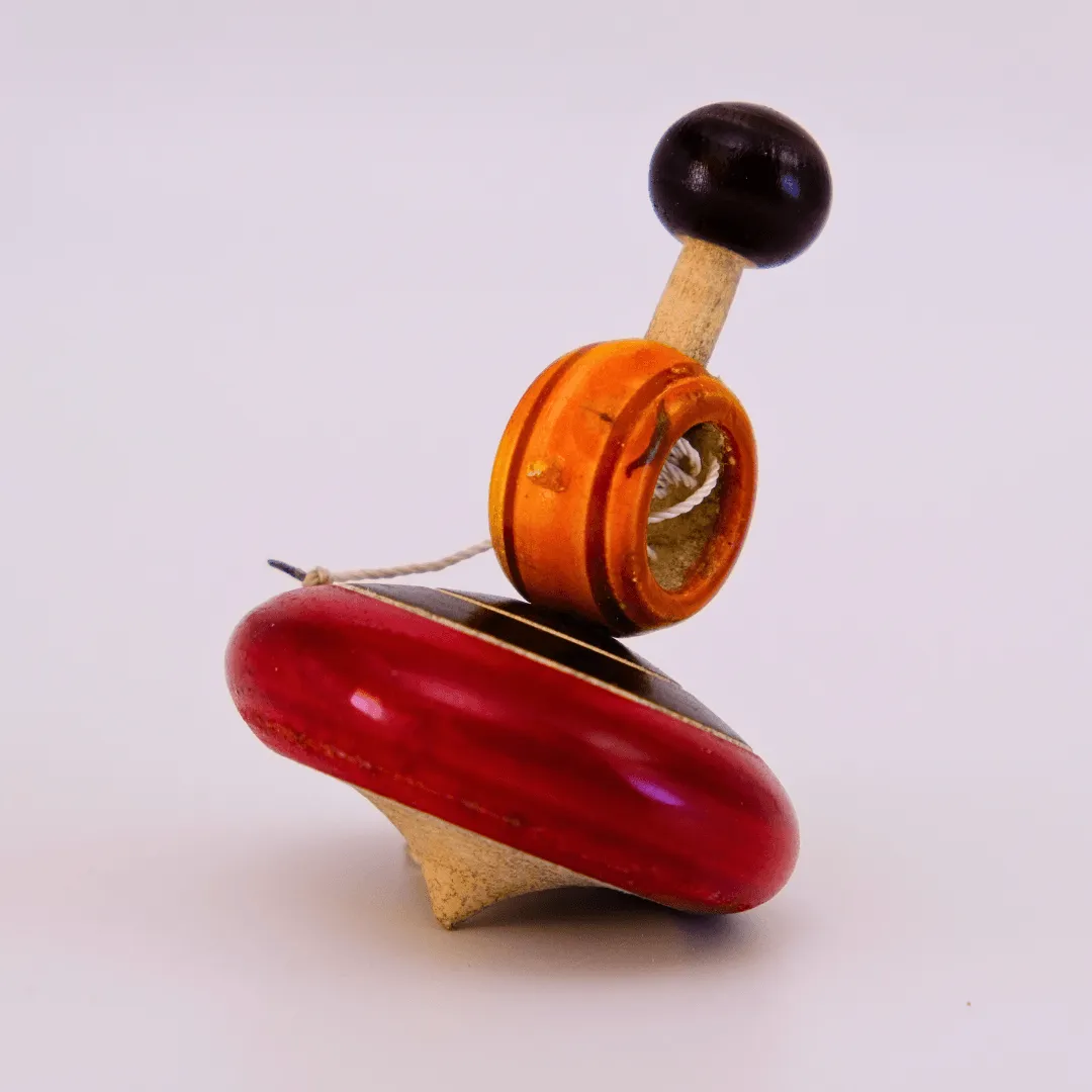 Hand made Small Wooden Spinning Tops-1 Piece (Random colour will be send)